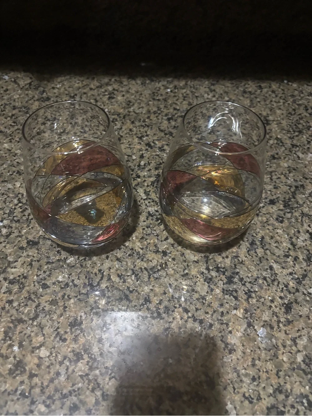Cornet Barcelona Stemless Wine Glasses with Gold and Pink Swirl Accents